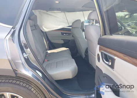 2021 Honda Cr-V Awd Touring z USA, uszkodzony, nr VIN 2HKRW2H94MH631640